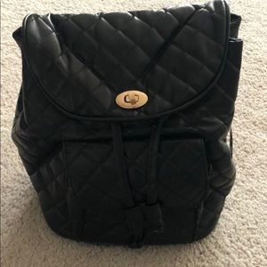 Black quilted small backpack
